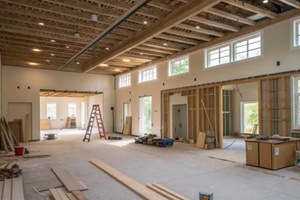 interior view of home office construction site showing renovation progress
