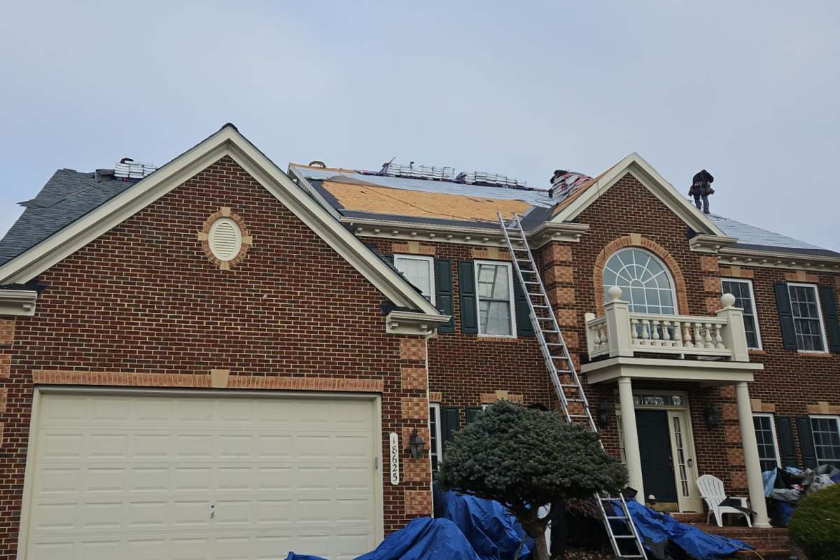 Rockville, MD roof replacement project contractors on roof