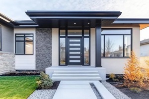 modern house entrance with fiberglass door and sidelight