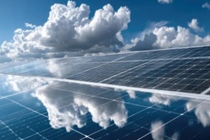 close-up of solar panels with a blue sky and clouds in the background