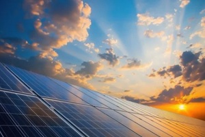 solar panels during sunset and cluods in the sky